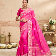 Pink embroidered tissue organza saree festive wear