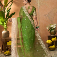 Green floral embroidered tissue organza saree party wear