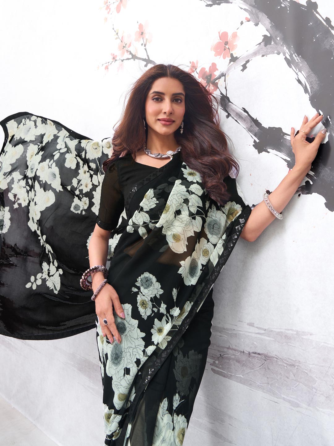 Black floral printed georgette saree wedding wear