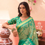 Green floral printed chiffon saree wedding wear