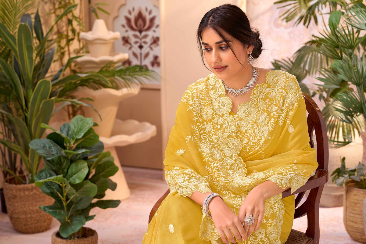 Yellow embroidered chiffon saree daily wear
