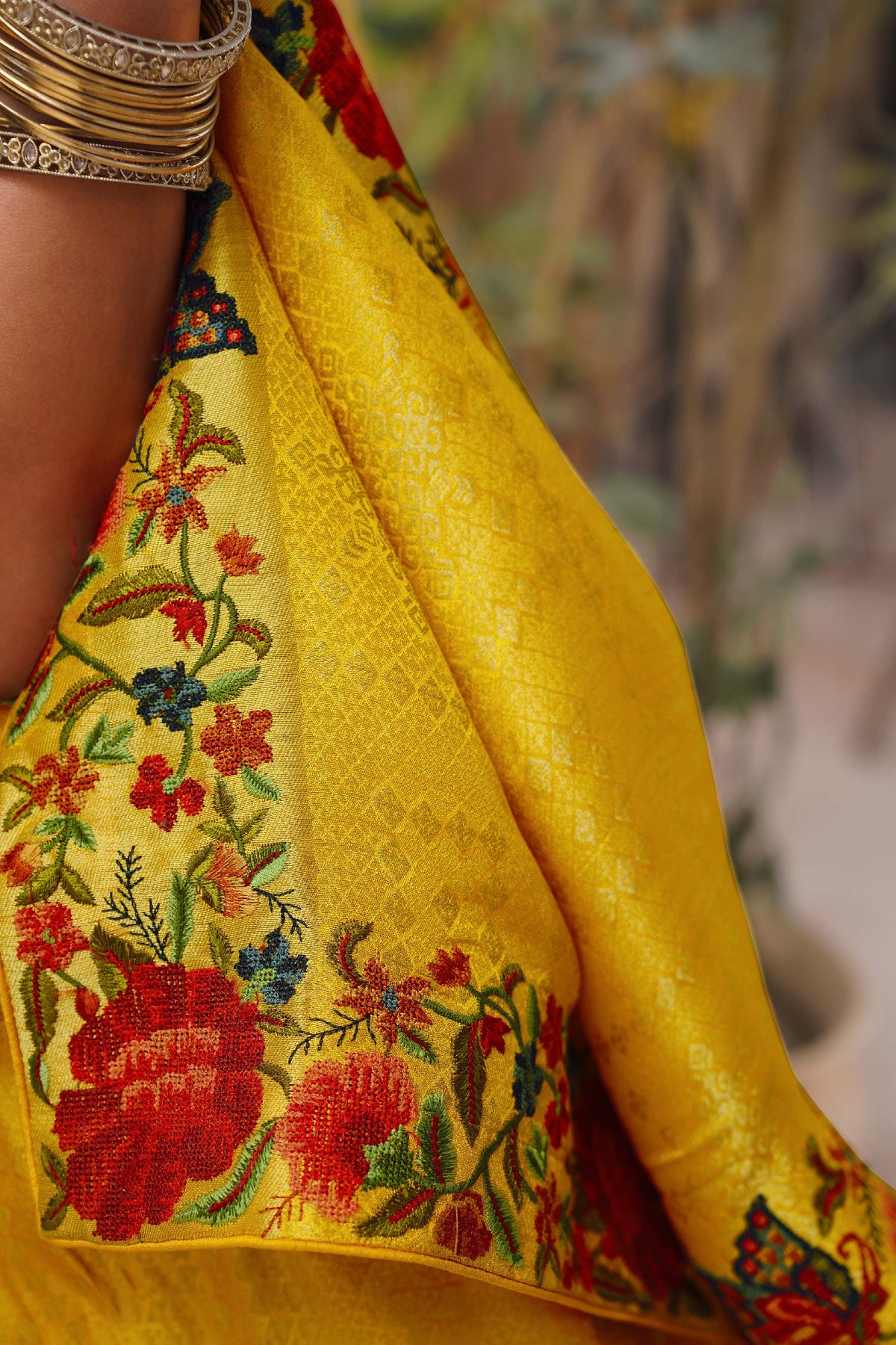 Yellow embroidered chiffon saree casual wear