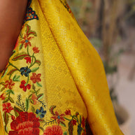 Yellow embroidered chiffon saree casual wear