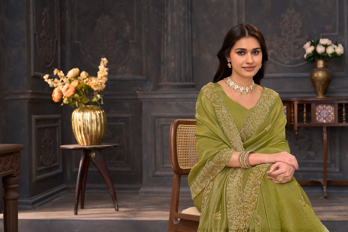 Green embroidered chiffon saree party wear