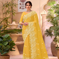 Yellow embroidered chiffon saree party wear