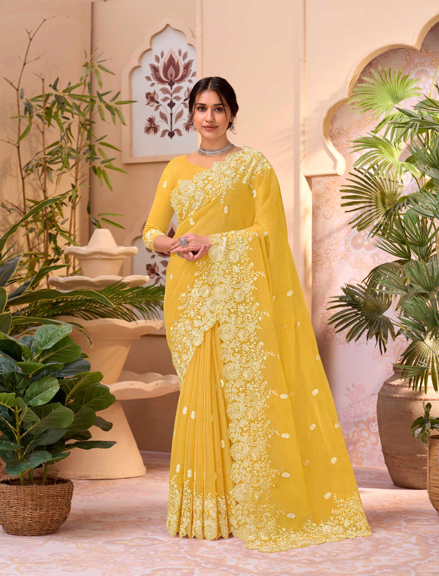 Yellow embroidered chiffon saree party wear