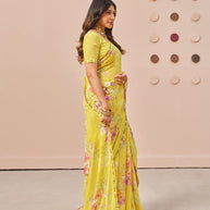 Yellow floral printed georgette saree festive wear