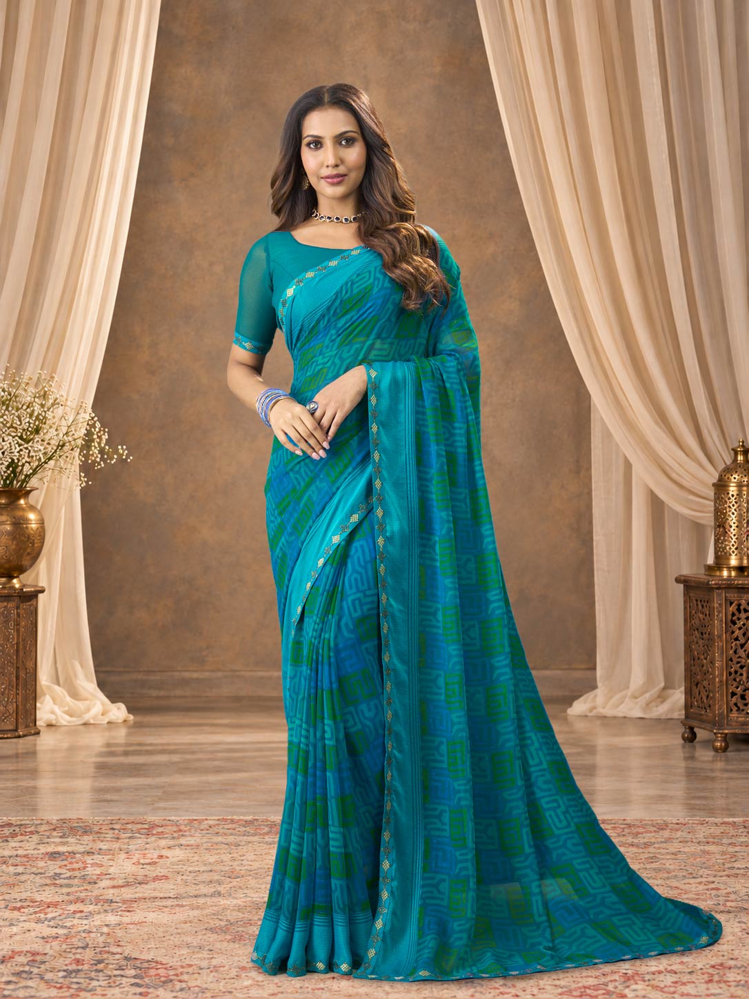 Blue printed georgette saree festive wear