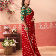 Red printed georgette saree wedding wear