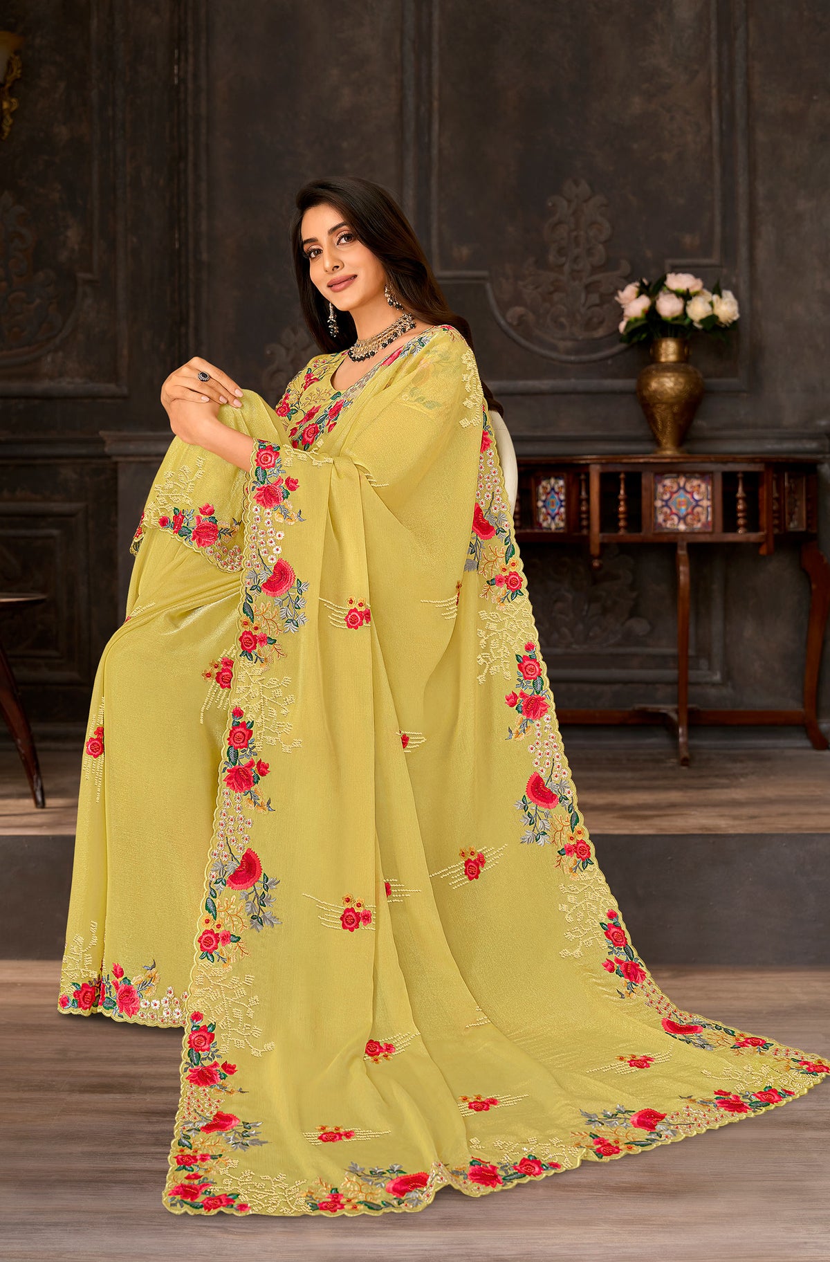 Yellow embroidered chiffon saree party wear