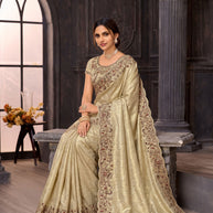 Cream embroidered silk blend saree wedding wear