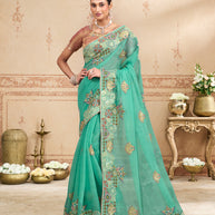 Blue embroidered tissue organza saree party wear