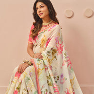 Cream printed georgette saree wedding wear