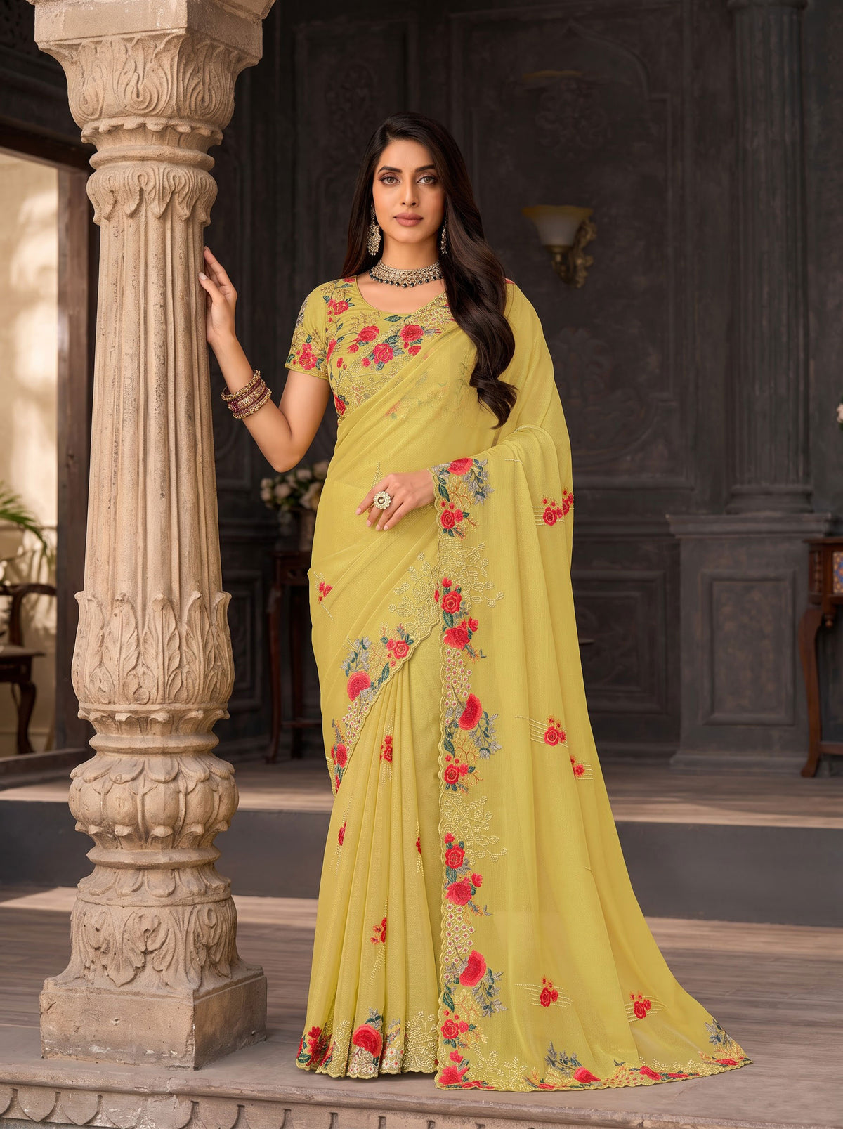 Yellow embroidered chiffon saree wedding wear