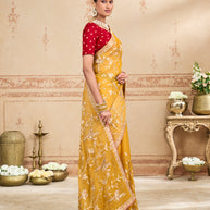 Mustard embroidered tissue organza saree casual wear