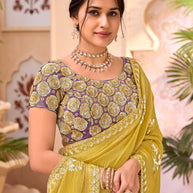Yellow embroidered chiffon saree festive wear