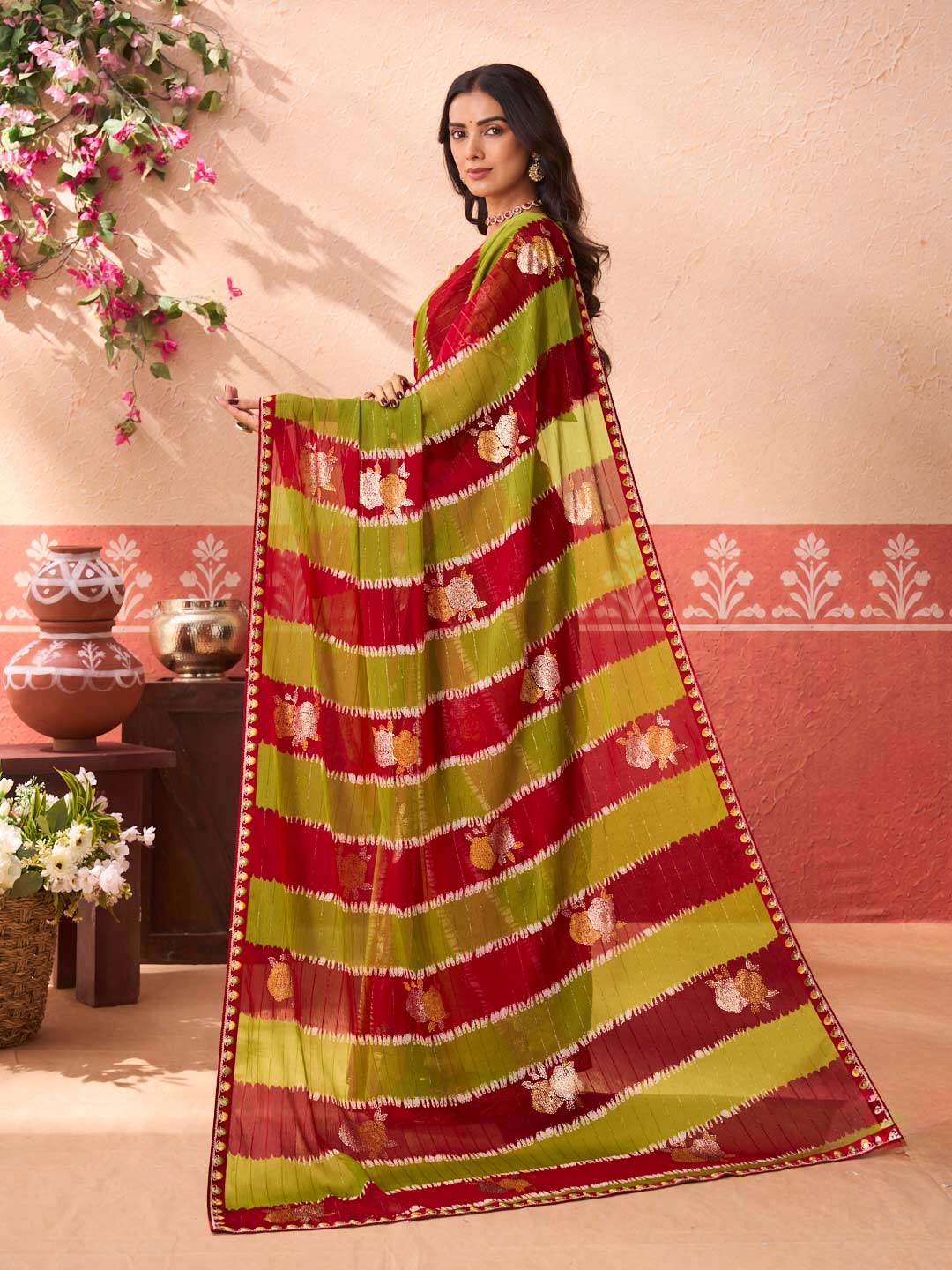 Green floral printed chiffon saree festive wear