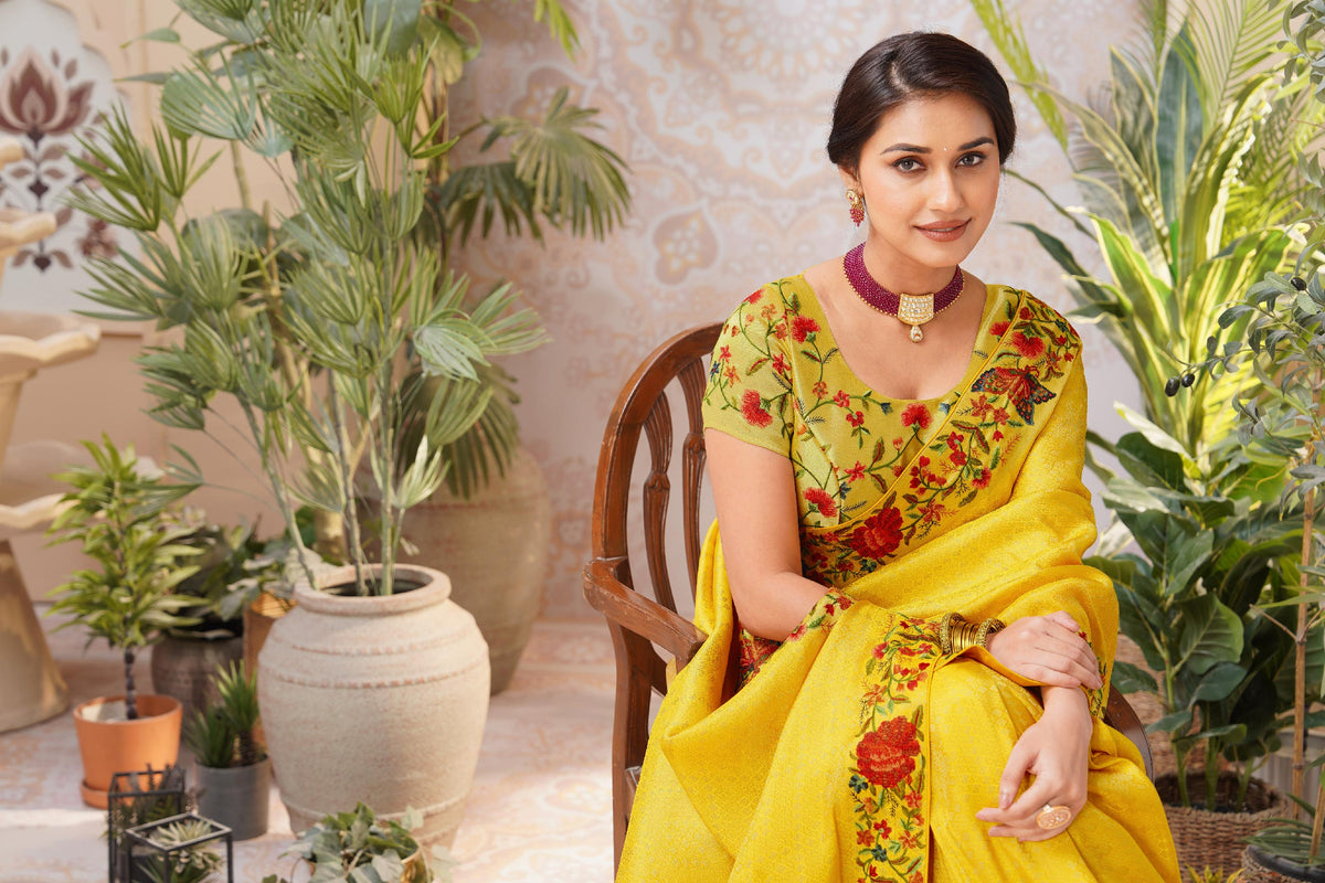 Yellow embroidered chiffon saree wedding wear