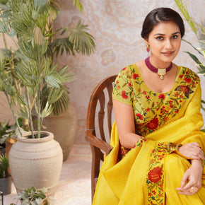 Yellow embroidered chiffon saree wedding wear