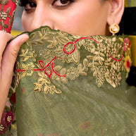 Green embroidered chiffon saree daily wear