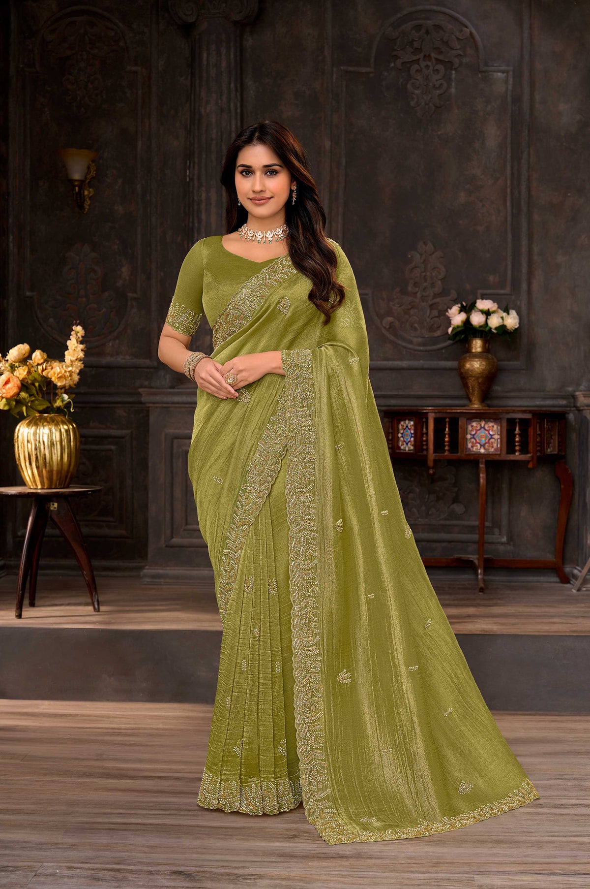Green embroidered chiffon saree festive wear
