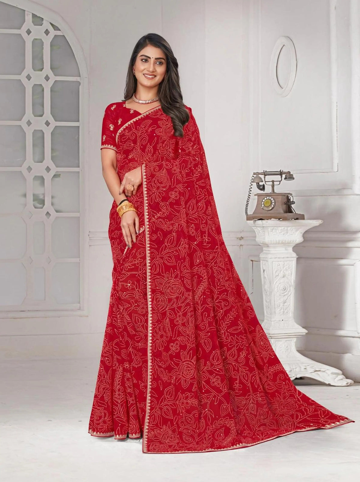 Red printed chiffon saree festive wear