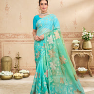 Green embroidered tissue organza saree festive wear