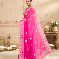 Pink embroidered tissue organza saree wedding wear