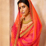 Laxmipati Brasso Orange Saree