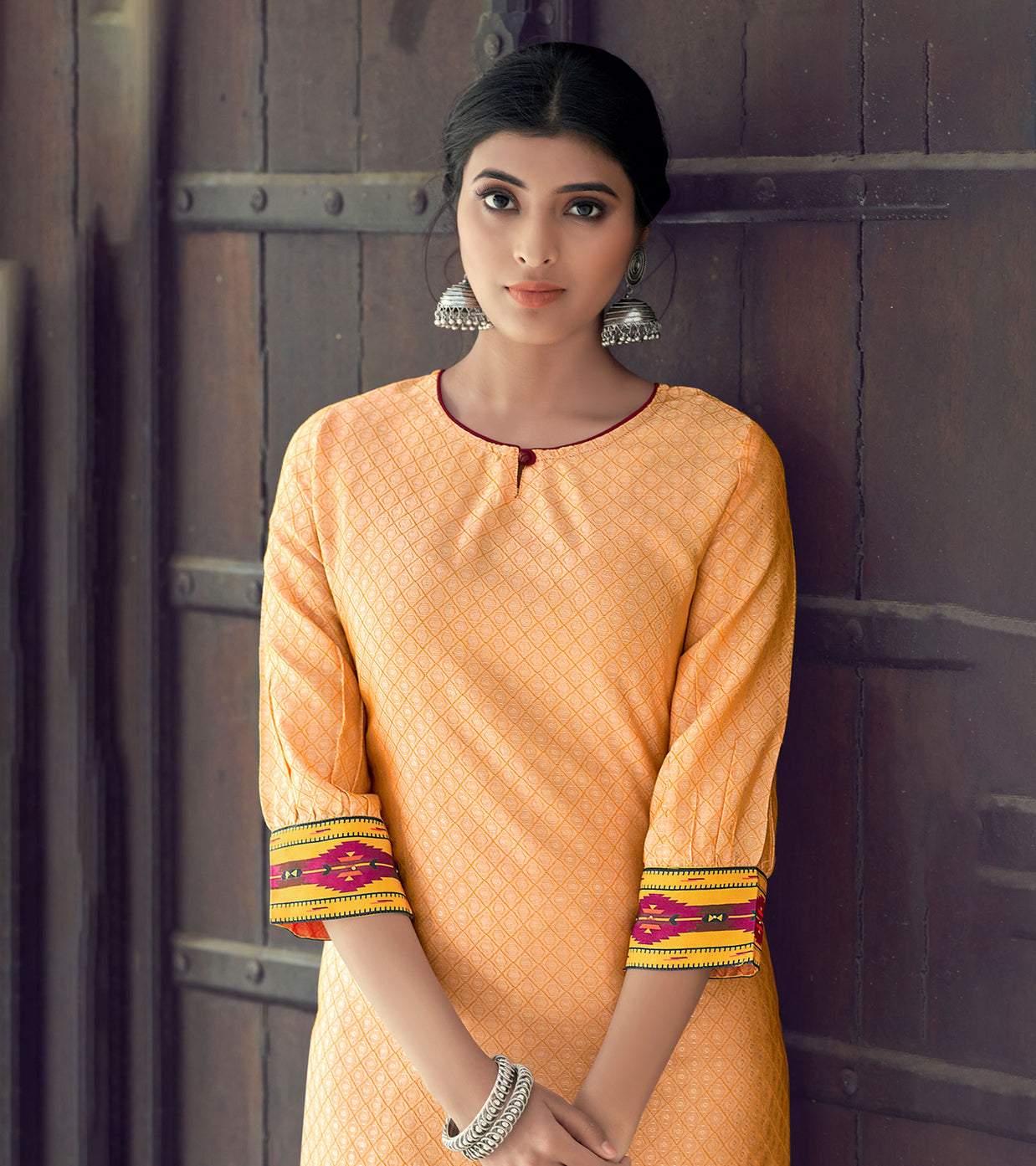 Laxmipati Nylon Viscose Dobby Burnt Orange Straight Cut Kurti