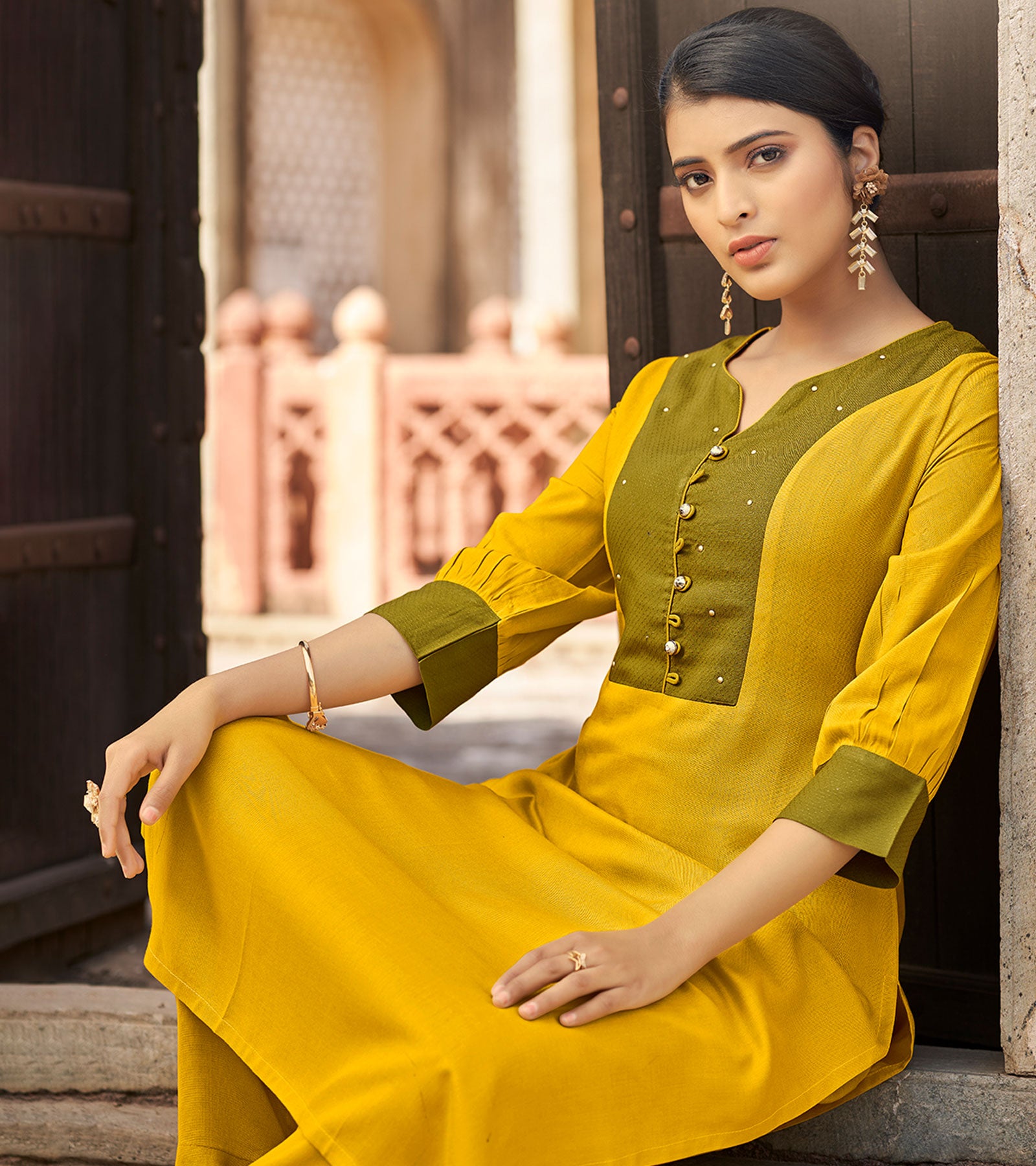 Laxmipati Ayon Daffodil Yellow Straight Cut Kurti With Self Textured Work