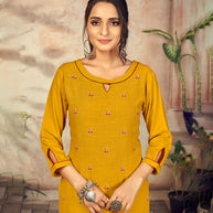 Laxmipati Rayon Tangerine Yellow Straight Cut Kurti Has Round Neck Variation , Embroidered Cufe &  Different Yoke Pattern