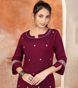 Laxmipati Bombay Velvet Mulberry Maroon Straight Kurti Have Fancy Necklines With All Over Grading Embossed Buttas   & Laces Use Of Contrast Colour Effect, Along With Pant