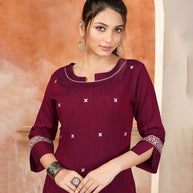 Laxmipati Bombay Velvet Mulberry Maroon Straight Kurti Have Fancy Necklines With All Over Grading Embossed Buttas   & Laces Use Of Contrast Colour Effect, Along With Pant