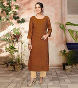 Laxmipati Bombay Velvet Cinamon Brown Straight Kurti Have Fancy Necklines With All Over Grading Embossed Buttas   & Laces Use Of Contrast Colour Effect, Along With Pant