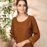 Laxmipati Bombay Velvet Cinamon Brown Straight Kurti Have Fancy Necklines With All Over Grading Embossed Buttas   & Laces Use Of Contrast Colour Effect, Along With Pant
