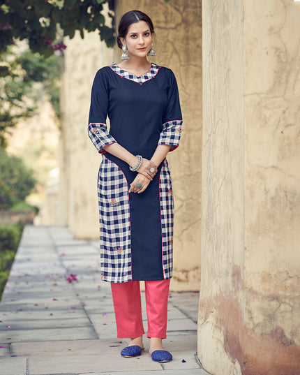 Laxmipati Rayon Cross And Swiss Slub Navy Blue And White Blue Checks Kurti With Two Fabrics By Giving All Over Grading Butta With Different Princess Lines , Fancy Yoke , Classy Necklines And Sleeve With Comfy Cuff.