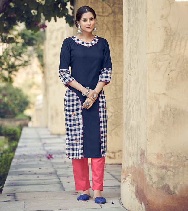 Laxmipati Rayon Cross And Swiss Slub Navy Blue And White Blue Checks Kurti With Two Fabrics By Giving All Over Grading Butta With Different Princess Lines , Fancy Yoke , Classy Necklines And Sleeve With Comfy Cuff.