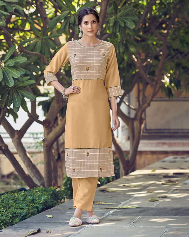 Laxmipati Rayon Cross And Swiss Slub Beige And Natural Beige Checks Kurti With Two Fabrics By Giving All Over Grading Butta With Different Princess Lines , Fancy Yoke , Classy Necklines And Sleeve With Comfy Cuff.