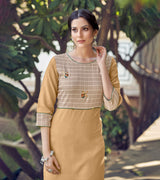 Laxmipati Rayon Cross And Swiss Slub Beige And Natural Beige Checks Kurti With Two Fabrics By Giving All Over Grading Butta With Different Princess Lines , Fancy Yoke , Classy Necklines And Sleeve With Comfy Cuff.