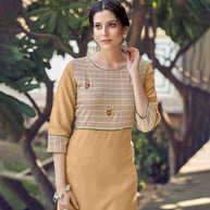 Laxmipati Rayon Cross And Swiss Slub Beige And Natural Beige Checks Kurti With Two Fabrics By Giving All Over Grading Butta With Different Princess Lines , Fancy Yoke , Classy Necklines And Sleeve With Comfy Cuff.
