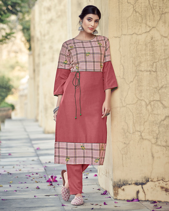 Laxmipati Rayon Cross And Swiss Slub Crimson Red And Checks Kurti With Two Fabrics By Giving All Over Grading Butta With Different Princess Lines , Fancy Yoke , Classy Necklines And Sleeve With Comfy Cuff.