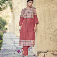 Laxmipati Rayon Cross And Swiss Slub Crimson Red And Checks Kurti With Two Fabrics By Giving All Over Grading Butta With Different Princess Lines , Fancy Yoke , Classy Necklines And Sleeve With Comfy Cuff.