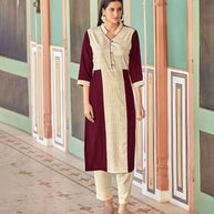 Laxmipati Bsy & Banjara Rosewood Red  Kurti With Two Fabrics By Giving Different Princess Lines , Fancy Yoke , Classy Necklines And Sleeve With Comfy Cuff.