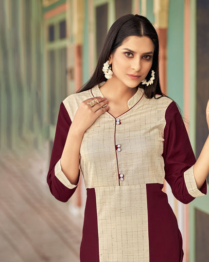 Laxmipati Bsy & Banjara Rosewood Red  Kurti With Two Fabrics By Giving Different Princess Lines , Fancy Yoke , Classy Necklines And Sleeve With Comfy Cuff.