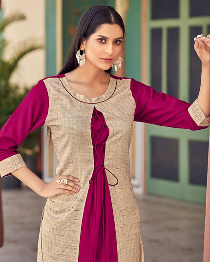 Laxmipati Bsy & Banjara Jazzberry Jam Pink Kurti With Two Fabrics By Giving Different Princess Lines , Fancy Yoke , Classy Necklines And Sleeve With Comfy Cuff.