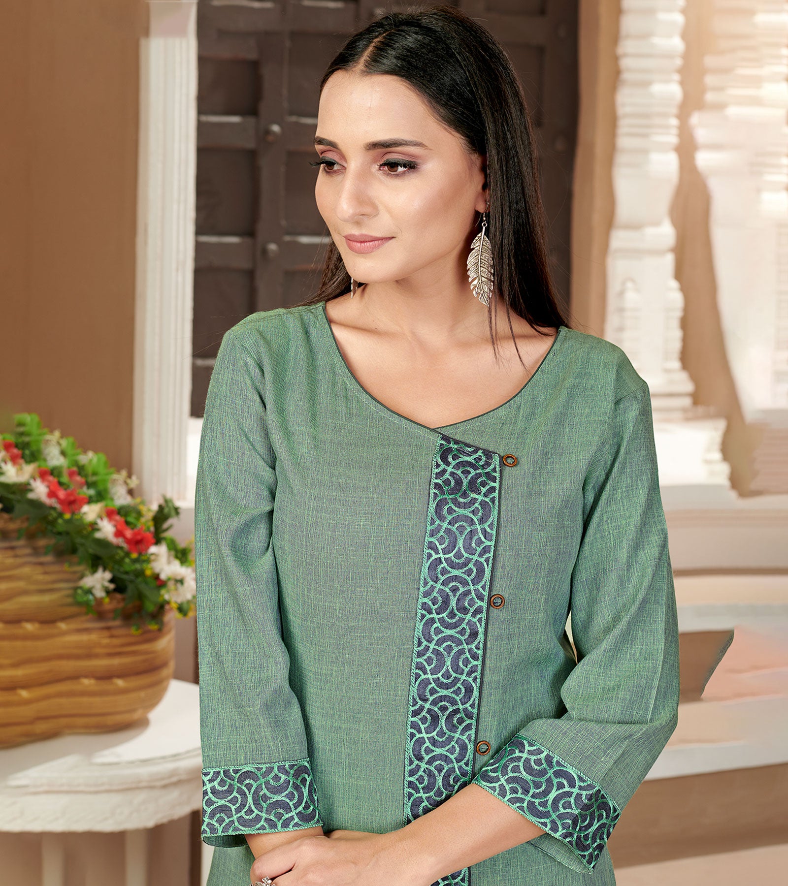 Laxmipati Rayon Cross Salem Green Beautifully Placed Embroidered Boarder Straightfit Kurti With Evergreen Necklines, Enhancing With Stylish Button .