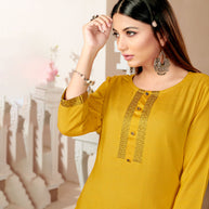 Laxmipati Rayon Cross Yellow  Beautifully Placed Embroidered Boarder Straightfit Kurti With Evergreen Necklines, Enhancing With Stylish Button .