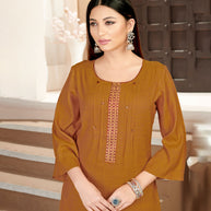 Laxmipati Rayon Cross Caramel Beautifully Placed Embroidered Boarder Straightfit Kurti With Evergreen Necklines, Enhancing With Stylish Button .