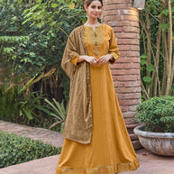 Laxmipati Muslin Majestique Musturd Flaired Length Gown With Dupatta